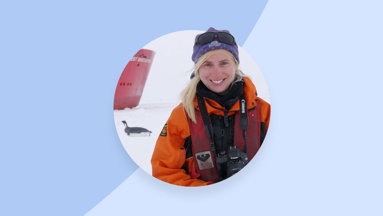 Photo of polar scientist Dr. Rachel Louise Tilling with penguin in the background